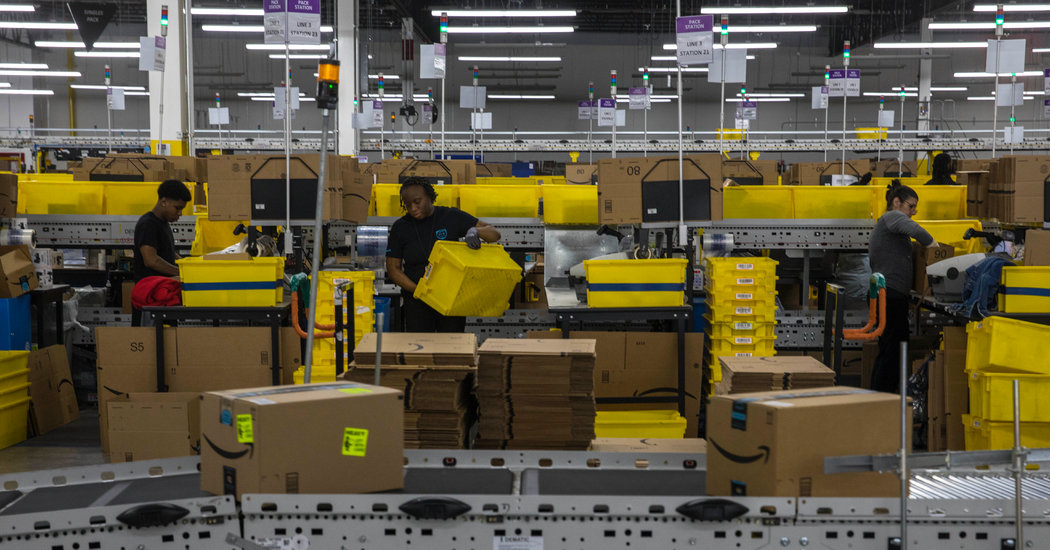 Inside an Amazon Warehouse, Robots’ Ways Rub Off on Humans